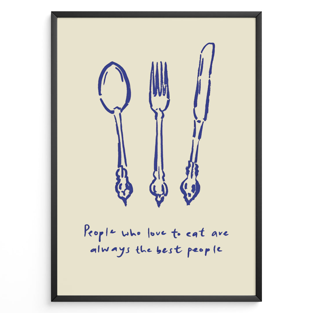 Kitchen quote poster with blue spoon, fork, and knife illustrations and the text “People who love to eat are always the best people” on a beige background in a black frame.