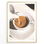 Indlæs billede til gallerivisning Coffee art print plakat showing milk being poured into a cup of espresso, creating a swirl pattern in a white cup on a saucer.
