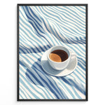 Indlæs billede til gallerivisning Minimalist espresso art print plakat featuring a white coffee cup on blue and white striped fabric in a black frame.
