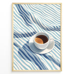 Indlæs billede til gallerivisning Minimalist espresso art print plakat featuring a white coffee cup on blue and white striped fabric in a Golden frame.
