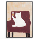Indlæs billede til gallerivisning Funny cat art print plakat showing a white cat sitting on a maroon chair holding a wine glass, framed in black on a beige background.
