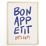 Indlæs billede til gallerivisning Minimalist poster with blue handwritten text “Bon Appétit” and red “Let’s Eat!” on a white background, framed in golden.
