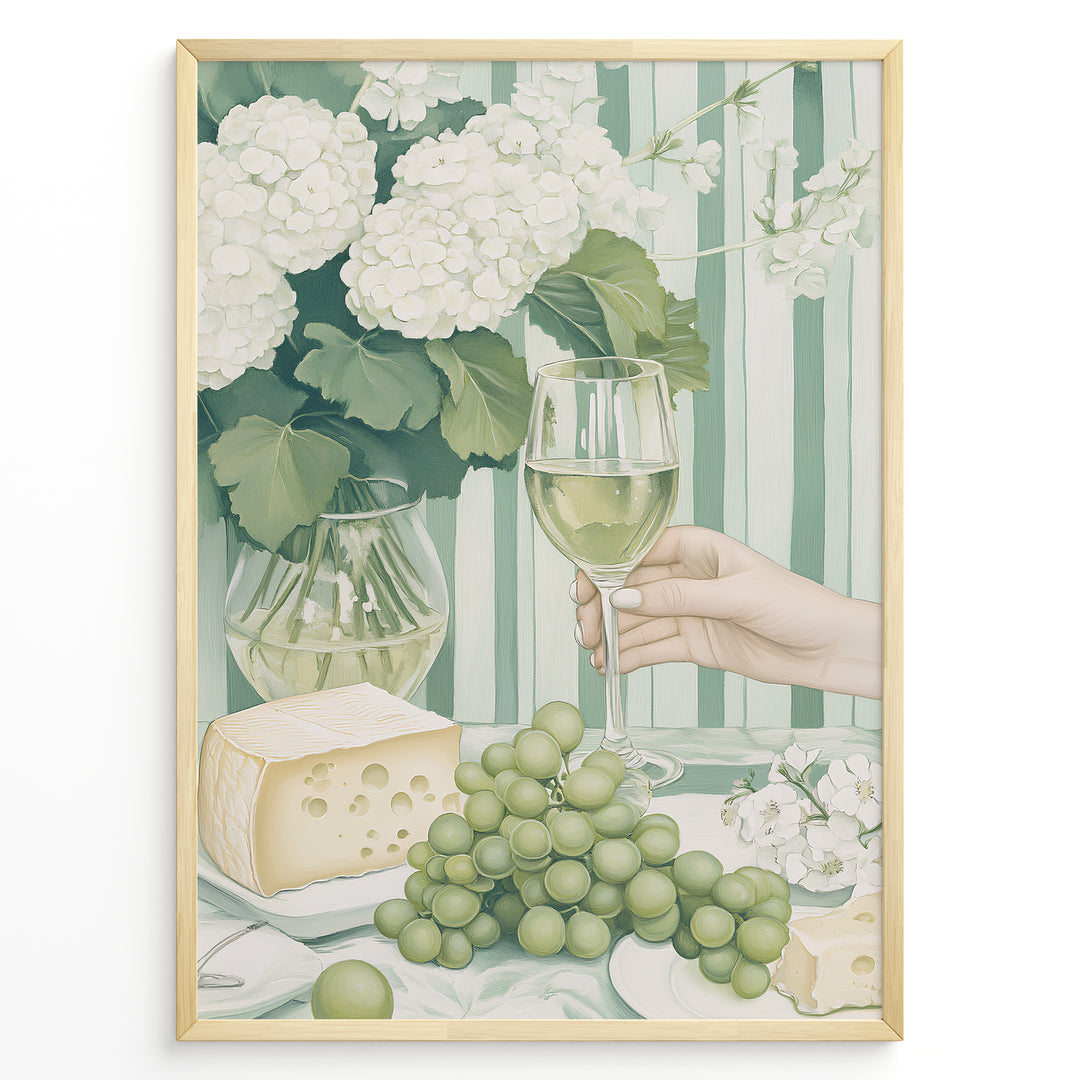 Elegant art print plakat of white wine glass, grapes, cheese, and hydrangeas on a green striped table with a hand holding a wine glass in a golden frame.