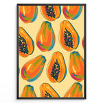 Indlæs billede til gallerivisning Colorful papaya pattern poster with whole and halved papayas in orange, green, and yellow tones on a beige background, framed in black for tropical kitchen wall décor.

