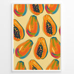 Indlæs billede til gallerivisning Colorful papaya pattern poster with whole and halved papayas in orange, green, and yellow tones on a beige background, framed in white for tropical kitchen wall décor.
