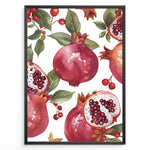 Indlæs billede til gallerivisning Vibrant pomegranate poster with red pomegranates, open fruits showing seeds, and green leaves on a white background, framed in black for modern kitchen or dining wall décor.

