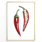 Indlæs billede til gallerivisning Minimalist red chili pepper plakat illustration showing whole and sliced chili with seeds, framed in black, ideal for modern kitchen or dining room wall art.
