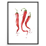 Indlæs billede til gallerivisning Watercolor plakat illustration of three red chili peppers with green stems and paint splatters, framed in black, ideal for modern kitchen or dining room décor.
