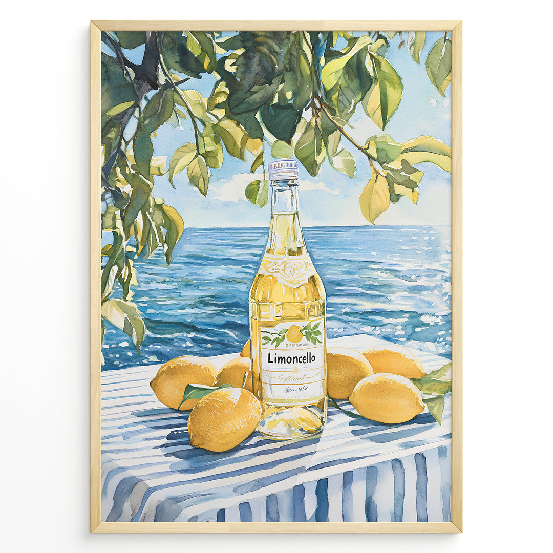 Limoncello art print plakat with a bottle of limoncello, lemons, and green leaves overlooking the blue sea on a striped tablecloth in a golden frame.