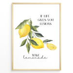 Indlæs billede til gallerivisning Watercolor lemon branch wall art with the quote “If life gives you lemons, make lemonade,” framed in black, ideal for uplifting kitchen or café décor.
