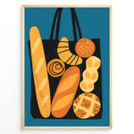 Indlæs billede til gallerivisning Modern art print of a tote bag filled with bread and pastries on a blue background — bakery-inspired kitchen wall décor.
