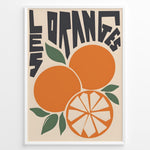 Indlæs billede til gallerivisning Retro French-style poster with bold lettering and illustrated oranges, including a sliced orange and green leaves.

