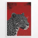 Indlæs billede til gallerivisning Illustrated leopard portrait with detailed spots and green eyes on a textured red background, framed in black.
