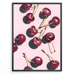Indlæs billede til gallerivisning Cherry art print plakat with hand-painted red cherries and stems on a pink background in a black frame.
