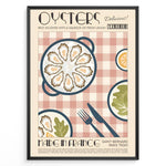 Indlæs billede til gallerivisning Vintage French oysters poster with illustrated oyster platter, lemon slices, and cutlery on a pink checkered background in a black frame.
