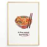 Indlæs billede til gallerivisning Funny ramen poster with illustrated noodle bowl, chopsticks, and text “in the mood for noods” underlined in red on a cream background in a golden frame.
