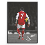 Indlæs billede til gallerivisning Poster featuring a football player in a red and white No. 7 jersey walking on a stadium field while holding a match ball, with a stylized signature at the bottom.
