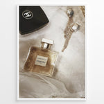 Indlæs billede til gallerivisning Fashion Plakat | Chanel Gabrielle Perfume Flat Lay with Earrings and Compact – Luxury Beauty Print Plakaty.dk | Flat lay image of Chanel Gabrielle perfume, a black Chanel compact, and gold statement earrings on soft white fabric.

