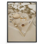 Indlæs billede til gallerivisning Fashion Plakat | Chanel No. 5 Perfume Flat Lay with Watch and Books – Neutral Aesthetic Print Plakaty.dk | Flat lay of Chanel No. 5 perfume bottle, gold watch, ring, and decorative shell on fashion books with soft floral blur in neutral tones.

