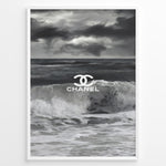 Indlæs billede til gallerivisning Fashion Plakat | Chanel Ocean Wave Black &amp; White Fashion Poster Plakaty.dk | Black and white ocean wave poster with the Chanel logo centered over crashing waves and a stormy sky.
