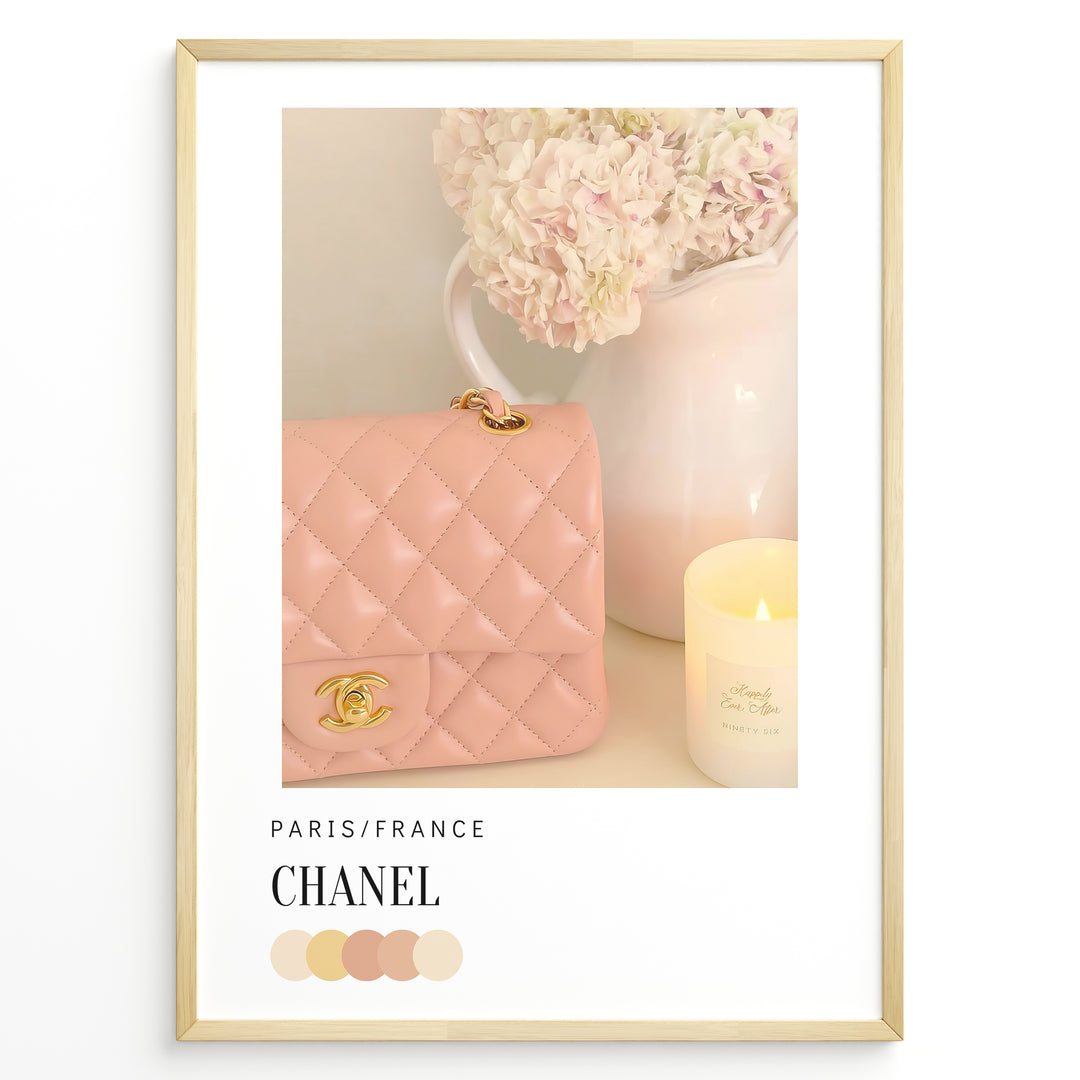 Fashion Plakat | Chanel in Bloom – Soft Pink Elegance Poster Plakaty.dk | Blush pink Chanel quilted handbag beside pastel flowers and a candle, evoking soft luxury and feminine Parisian style.