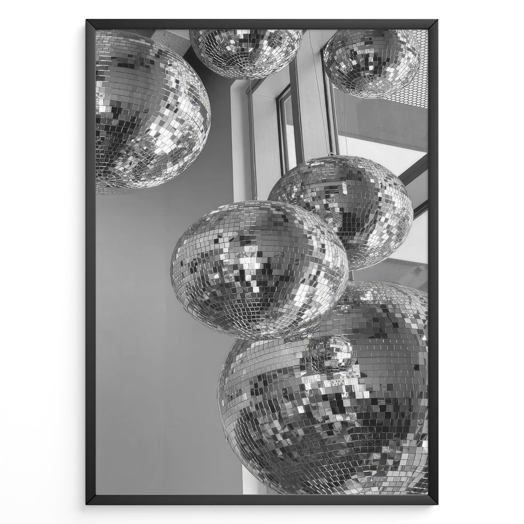 Fashion Plakat | Cluster of Disco Balls in Natural Light Plakaty.dk | Black and white photo of multiple hanging disco balls reflecting natural light near large windows