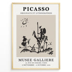 Indlæs billede til gallerivisning Framed Picasso Don Quixote art poster with minimalist black sketch of riders and windmills on a beige background.
