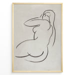 Indlæs billede til gallerivisning Framed minimalist nude sketch poster with soft black line art of a seated female figure on a light textured beige background.
