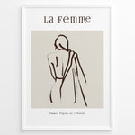 Indlæs billede til gallerivisning Framed “La Femme No.1” poster with minimalist brown line art of a woman’s back draped in fabric on a beige background.
