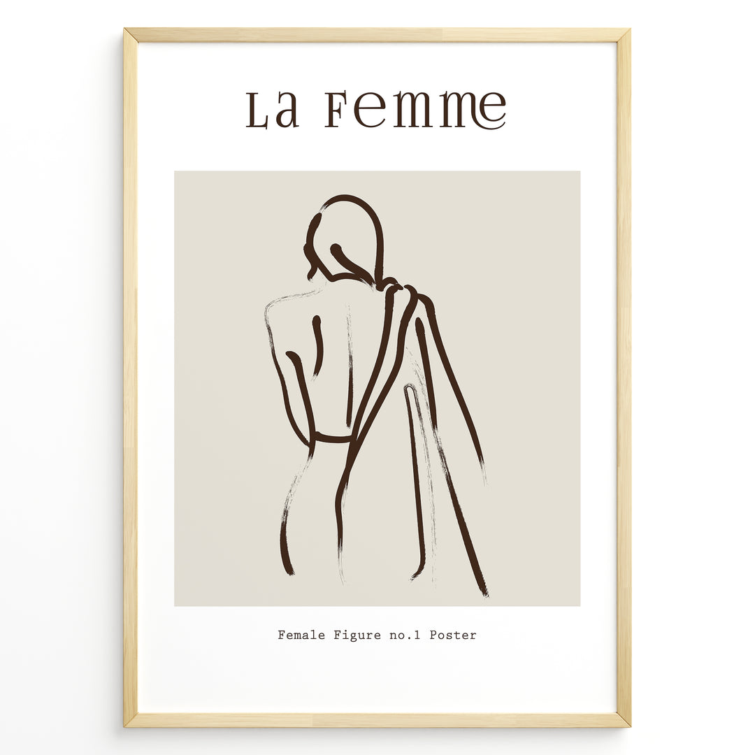 Framed “La Femme No.1” poster with minimalist brown line art of a woman’s back draped in fabric on a beige background.