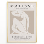 Indlæs billede til gallerivisning Framed Matisse Papiers Decoupés poster featuring abstract nude figure artwork in beige and white with French exhibition text.
