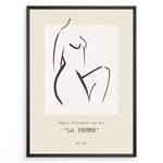 Indlæs billede til gallerivisning Framed La Femme poster featuring minimalist female silhouette line art in black on a beige background with modern typography.

