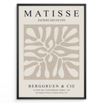 Indlæs billede til gallerivisning Framed Matisse Papiers Découpés poster with abstract beige cut-out shapes and black typography on a neutral background.

