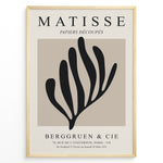 Indlæs billede til gallerivisning Framed Matisse Papiers Découpés poster featuring black abstract botanical shapes on a beige background with Berggruen &amp; Cie text.
