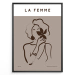 Indlæs billede til gallerivisning Framed “La Femme No.03” poster with minimalist brown line art of a woman holding a flower on a taupe background from the Bohemian Collection.
