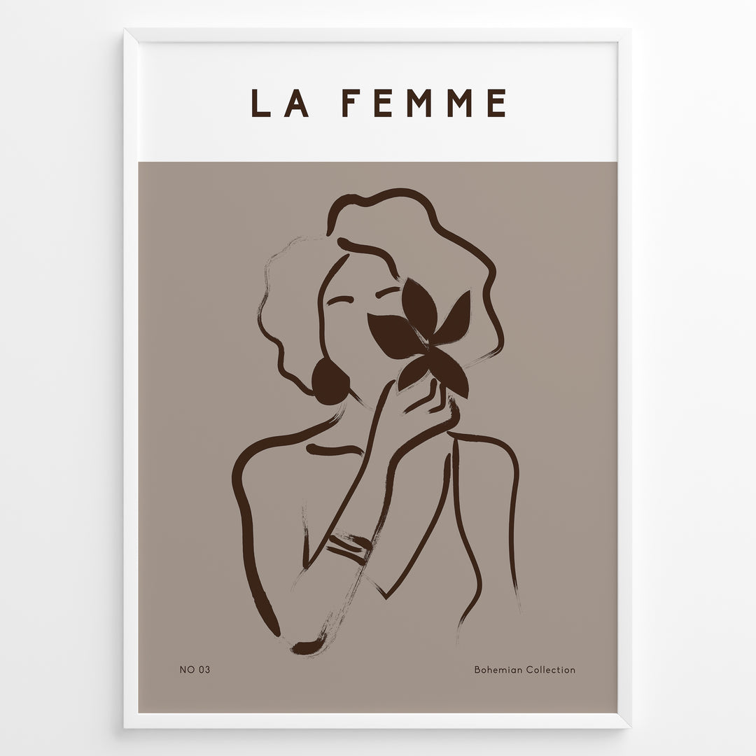 Framed “La Femme No.03” poster with minimalist brown line art of a woman holding a flower on a taupe background from the Bohemian Collection.