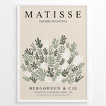 Indlæs billede til gallerivisning Framed Matisse-style botanical poster with abstract green and white leaf cutout shapes and beige background, titled “Papiers Découpés.”
