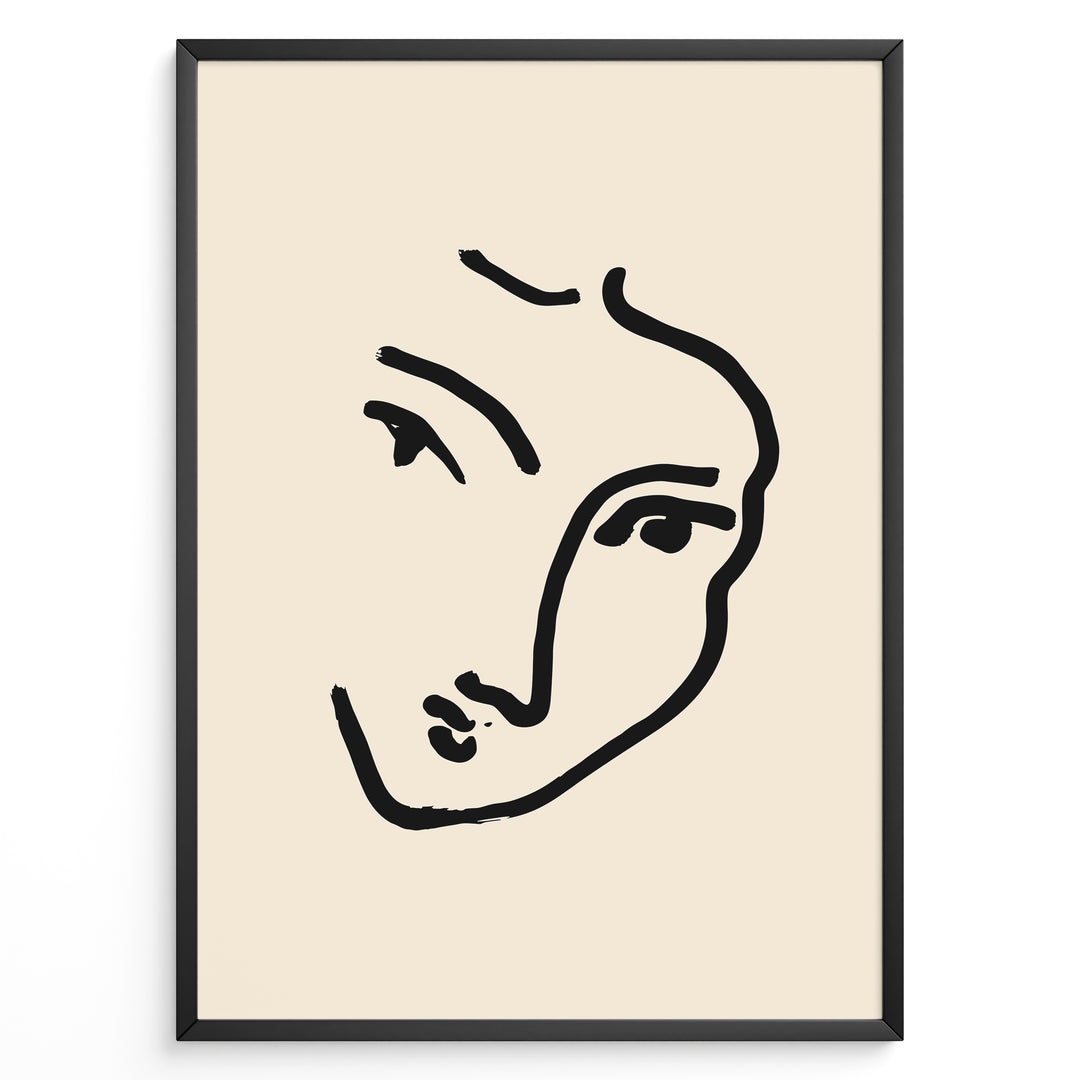Minimal abstract face line art poster in black frame on beige background.