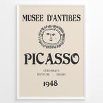 Indlæs billede til gallerivisning Framed Picasso Musée d’Antibes 1948 exhibition poster with a minimalist face illustration and vintage typography on a beige background.
