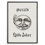 Indlæs billede til gallerivisning Framed Duke’s Little Joker vintage poster with detailed moon face illustration smoking a cigarette on a beige textured background.
