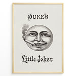 Indlæs billede til gallerivisning Framed Duke’s Little Joker vintage poster with detailed moon face illustration smoking a cigarette on a beige textured background.
