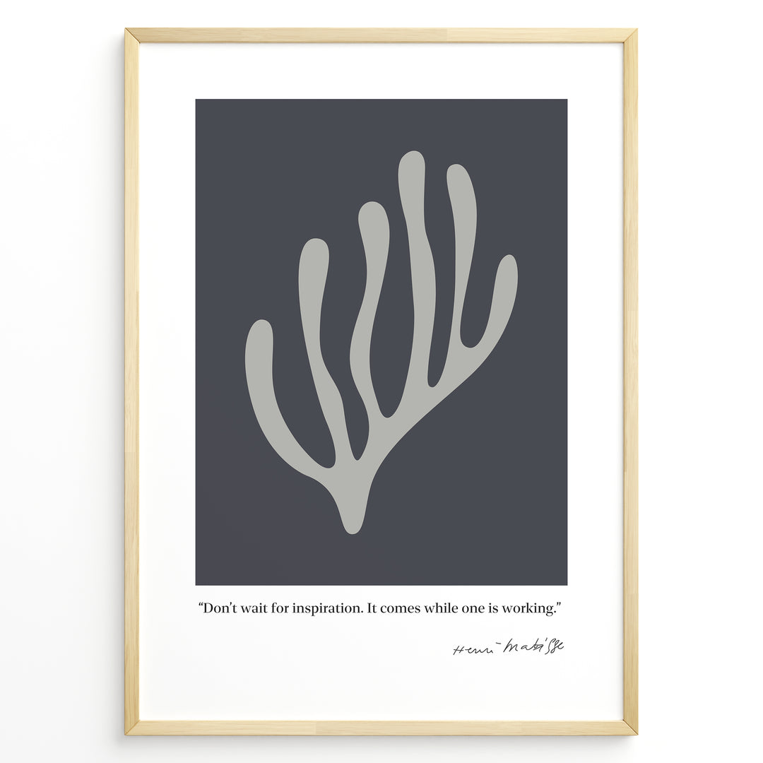 Framed Henri Matisse abstract coral art poster with grey organic shape on dark background and inspirational quote at the bottom.