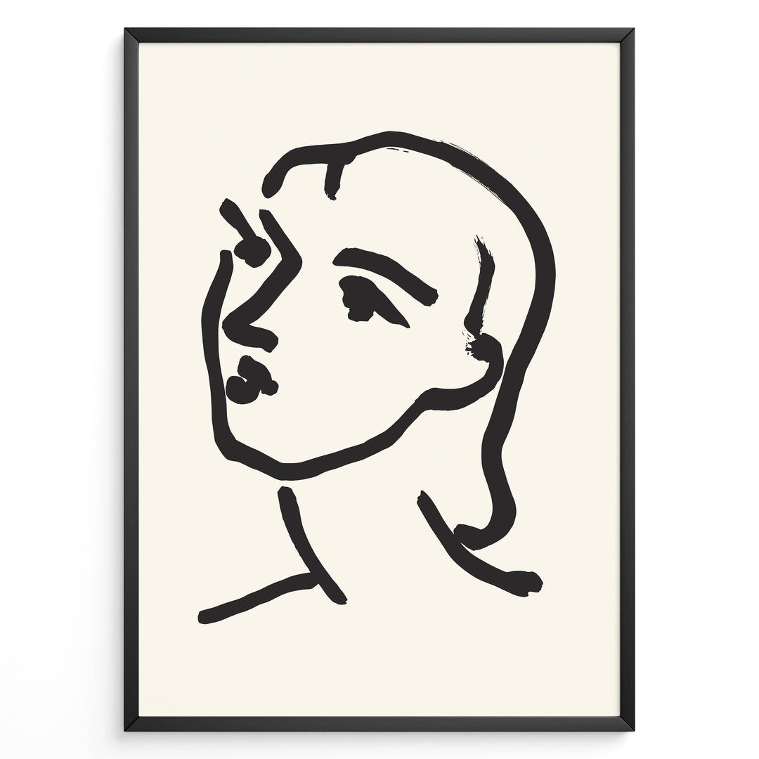 Minimalist black and white abstract face line art print plakat in a modern black frame on cream background.