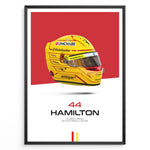 Indlæs billede til gallerivisning Framed poster of Lewis Hamilton’s yellow Ferrari F1 helmet with red background, featuring number 44 and Scuderia Ferrari branding.
