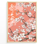 Indlæs billede til gallerivisning Japanske plakater | Framed Japanese art print of white and pink cherry blossoms on branches against a soft pink background.
