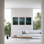 Indlæs billede til gallerivisning Triptych wall art plakat of the Kick Sauber F1 Team C44 Formula 1 car in a sleek black-and-green livery, displayed in a modern living room with black leather furniture.
