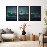 Indlæs billede til gallerivisning Triptych wall art plakat of the Kick Sauber F1 Team C44 Formula 1 car in a sleek black-and-green livery, displayed in a modern living room with black leather furniture.
