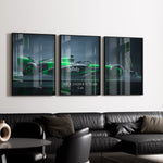 Indlæs billede til gallerivisning Triptych wall art plakat of the Kick Sauber F1 Team C44 Formula 1 car in a sleek black-and-green livery, displayed in a modern living room with black leather furniture.
