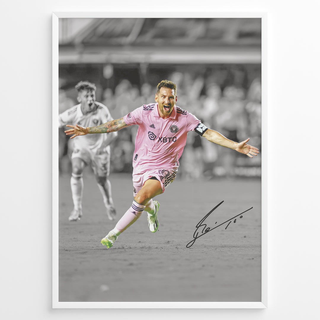 Plakat of Lionel Messi celebrating a goal in pink Inter Miami jersey, arms spread wide, with printed signature and black-and-white background.