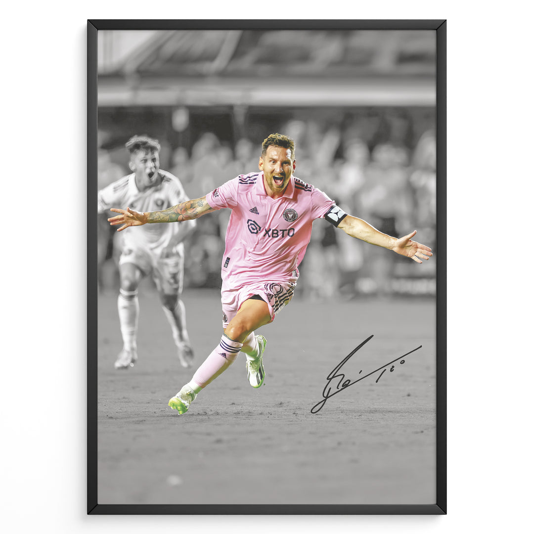 Plakat of Lionel Messi celebrating a goal in pink Inter Miami jersey, arms spread wide, with printed signature and black-and-white background.